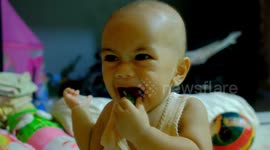 Baby tastes lemon and has hilarious reaction