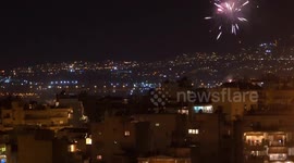 Greeks celebrate Orthodox Easter from the safety of their balconies amid COVID-19 lockdown