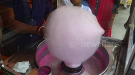 Making of cotton candy.