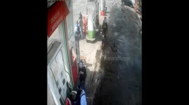 Group of four thieves on motorbikes sneak off with gas station money in Indonesia