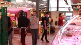 Shoppers in Llibertat Market in Barcelona during lockdown