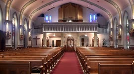 Empty Mass as the organist plays on due to the virus