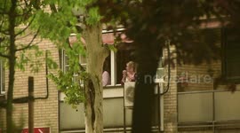 Madrid residents on lockdown applaud frontline coronavirus workers