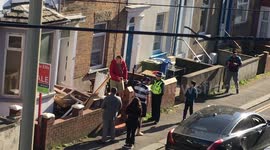 UK police appear to shut down house gathering during coronavirus lockdown