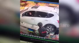 Car smashes into Chinese fruit shop after driver presses accelerator by mistake