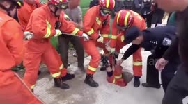 Chinese fireman hangs upside down to save toddler trapped in deep well