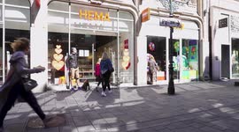 people in germany go shopping again, after small shops were allowed to open