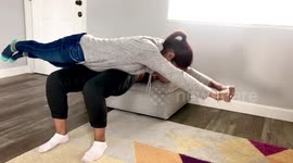 No barbell? No problem! Personal Trainer demos human hip thrusting!