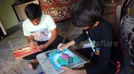 kids playing games & parents play their own gamed amid COVID-19 lockdown in southern India.