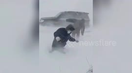 Strong blizzard hits Chinese city, burying vehicles and blocking residential houses