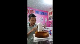 Vietnamese baker creates cute dog-themed cream cake