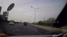 Flying manhole cover narrowly misses car on Chinese highway