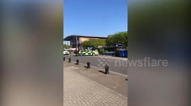 Gunman shooting from his balcony in south-east UK town arrested by armed police