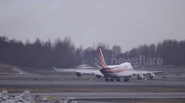 Kalitta Air 747-400F forming clouds on departure from Anchorage, Alaska