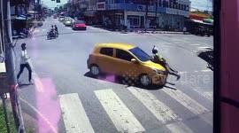 Runaway Thai driver drags policeman on car bonnet for over a mile to avoid being checked