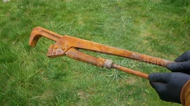 Rusty old wrench restored into a brand new looking tool