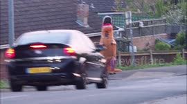 Dinosaur shows support during clap for carers in UK