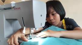 Malaysian schoolgirl sews 100 sets of PPE for health workers treating COVID-19 patients
