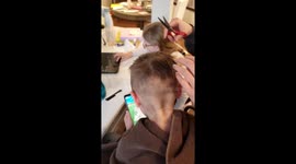 Canadian man creates an 'Isolation Barber Shop' with his family amid COVID-19 lockdown