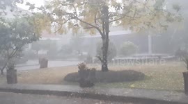 Large hail storm batters building during tropical storm in northern Thailand