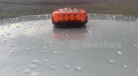 Storm-Chaser captures Hailstone after spotting funnel cloud in South Dakota