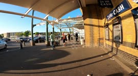 Woman has an altercation with Morrison's security. Possibly shoplifting bottles of champagne.