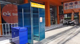 Shop in Thailand uses homemade sanitising tunnel in attempt to prevent spread of coronavirus