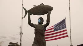 New Jersey: Statue wears N95 mask as American flag flies at half-mast