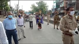 Police themed coronavirus-shaped helmets and wear yamraj dressed, to warn people to stay inside during India's lockdown