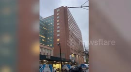 Hospital staff in New York cheer to show support for on-duty staff struggling with COVID-19 pandemic