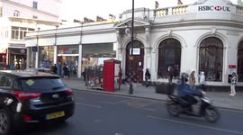 Shoppers observe proper coronavirus social distancing outside Tesco Express in South Kensington - London