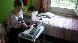 Young woman works from home during coronavirus quarantine in Spain