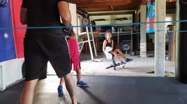 Little brother and sister working pads with dad