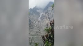 Dramatic moment avalanche hurtles towards village in north India