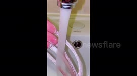 Russian woman documents how to clean her 12 centimeters-long nails