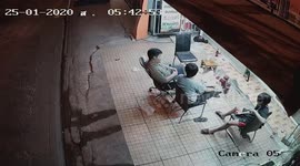 Shocking moment 'drunk driver' smashes through shop injuring three men sitting outside