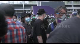 Protesters return to Hong Kong's streets to mark anniversary of Prince Edward station attack
