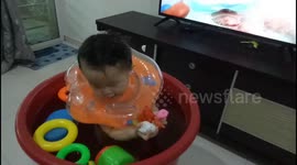 Toddler enjoys homemade spa during COVID-19 lockdown