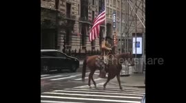 Man rides his horse through empty New York streets amid COVID-19 lockdown