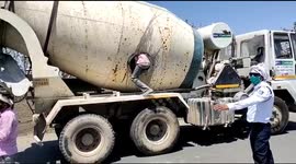 Indian police catch 18 people travelling illegally in cement mixer during lockdown