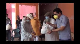 Food distributed by police to leper colony in north India