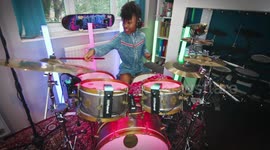 9 Year Old Drummer Girl Rocks Out to
