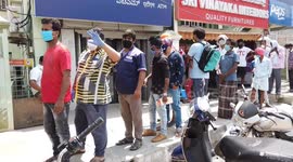 Huge queue spotted outside liquor store in India as it reopens after 41 days of lockdown