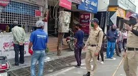 Long queue in front of alcohol shops as stores open after 40-day-long nationwide lockdown in northern India