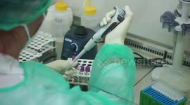 Coronavirus: Medical workers testing samples for covid-19 SARS-CoV-2 virus