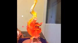 Vietnamese baker creates a beautiful red dragon from cream