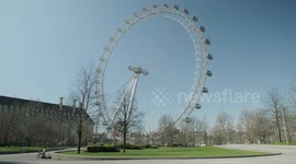 Lockdown London, London eye closed and empty street during coronavirus pandemic, no people