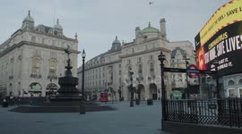 Lockdown London, Empty Piccadilly Circus, Eros statue and underground station during coronavirus pandemic, no people