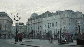 Lockdown London, Empty Piccadilly Circus, Eros statue and underground station during coronavirus pandemic, no people