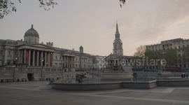 Lockdown London, Empty Trafalgar Square with National Gallery and fountain during coronavirus pandemic, no people
